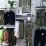 Rear hung clothing display system